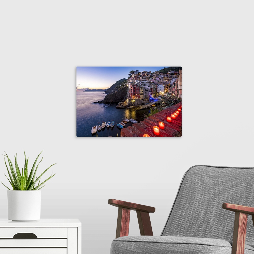 A modern room featuring Europe, Italy, Cinque Terre. the little harbour of Riomaggiore at Sunset.