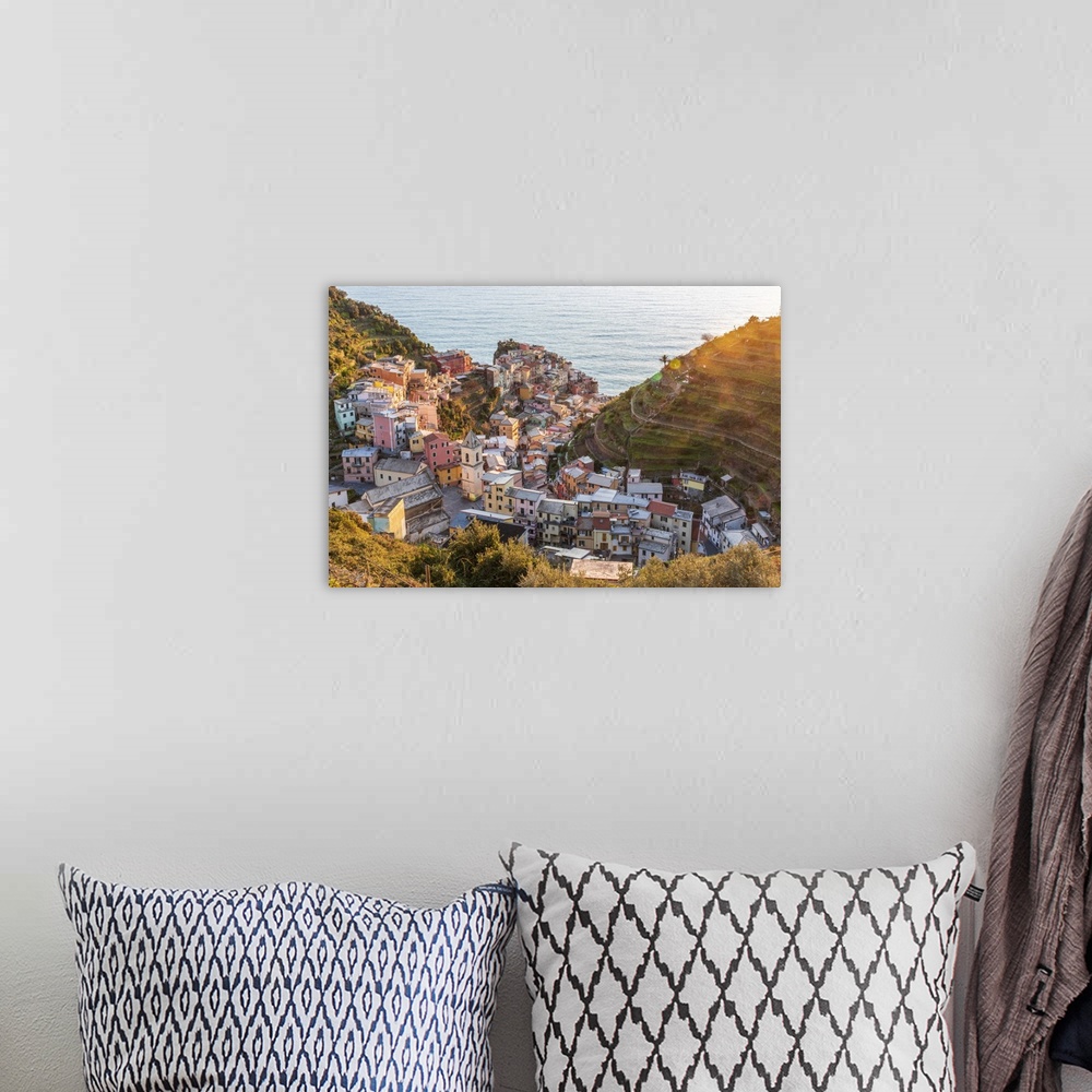 A bohemian room featuring Europe, Italy, Liguria. View over the Cinque Terre village Manarola at sunset