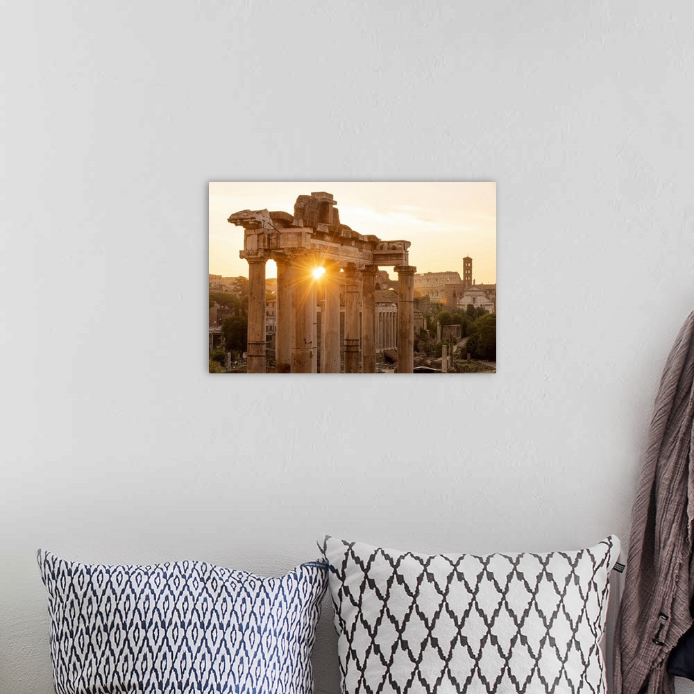 A bohemian room featuring Europe, Italy, Rome. The Forum Romanum with the temple of Saturn in the rising sun.