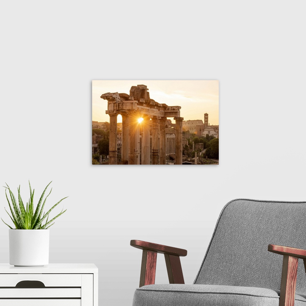 A modern room featuring Europe, Italy, Rome. The Forum Romanum with the temple of Saturn in the rising sun.