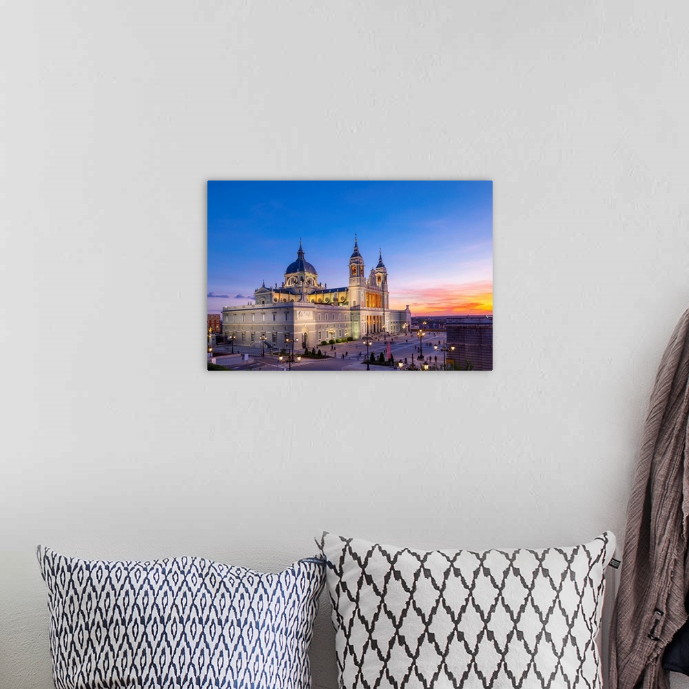 A bohemian room featuring Exterior of Almudena Cathedral at Sunset, Madrid, Spain.