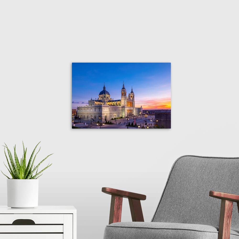 A modern room featuring Exterior of Almudena Cathedral at Sunset, Madrid, Spain.