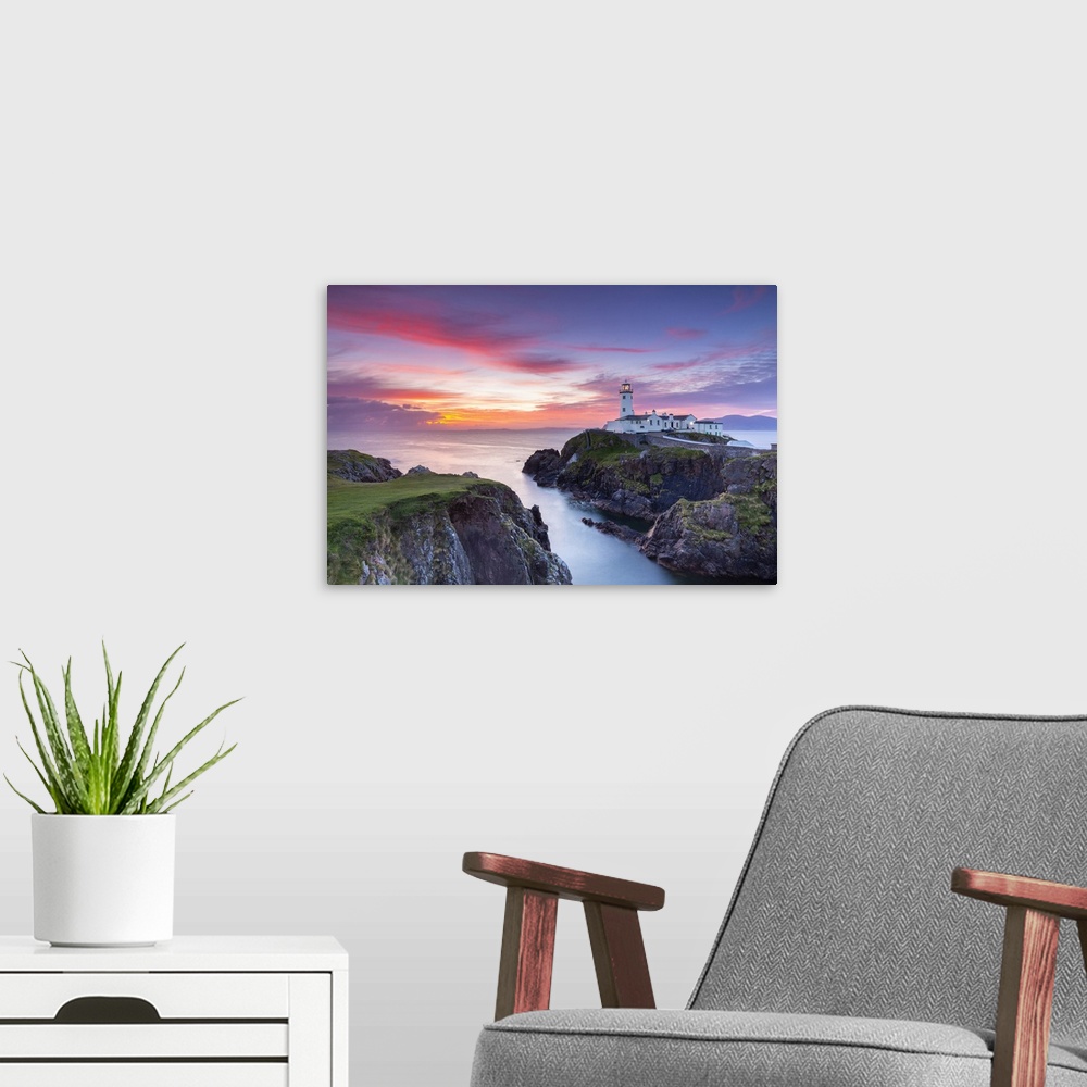 A modern room featuring Fanad Head lighthouse at sunrise, County Donegal, Ulster region, Ireland.