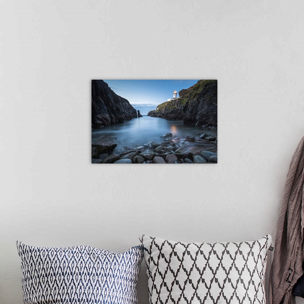 A bohemian room featuring Fanad Head (Fanaid) lighthouse, County Donegal, Ulster region, Ireland, Europe. View of the light...