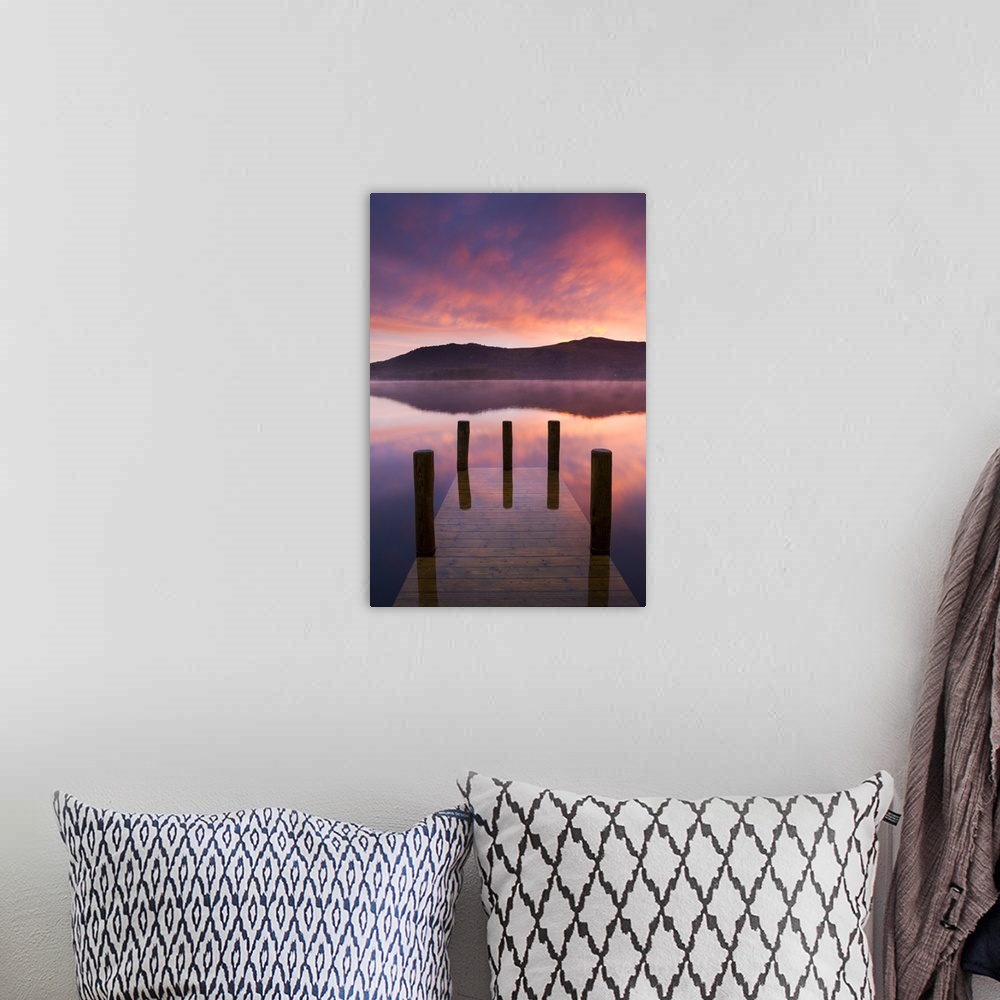 A bohemian room featuring Fiery sunrise over Derwent Water from Hawes End jetty, Lake District National Park, Cumbria, Engl...