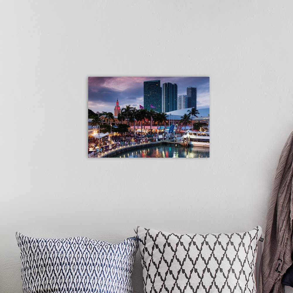 A bohemian room featuring USA, Florida, Miami, city skyline with Bayside Mall and Fredom Tower, evening