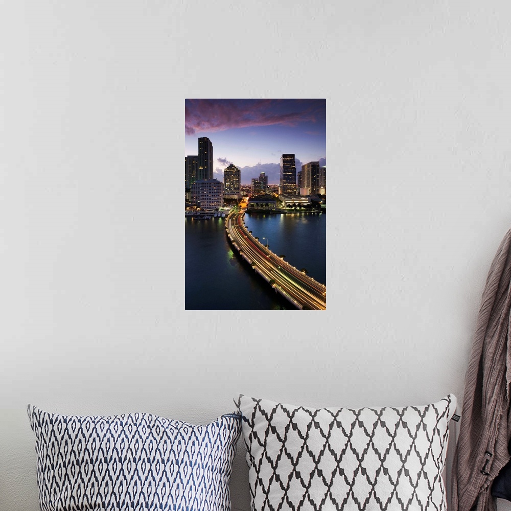 A bohemian room featuring USA, Florida, Miami, elevated city skyline from Brickell Key, evening