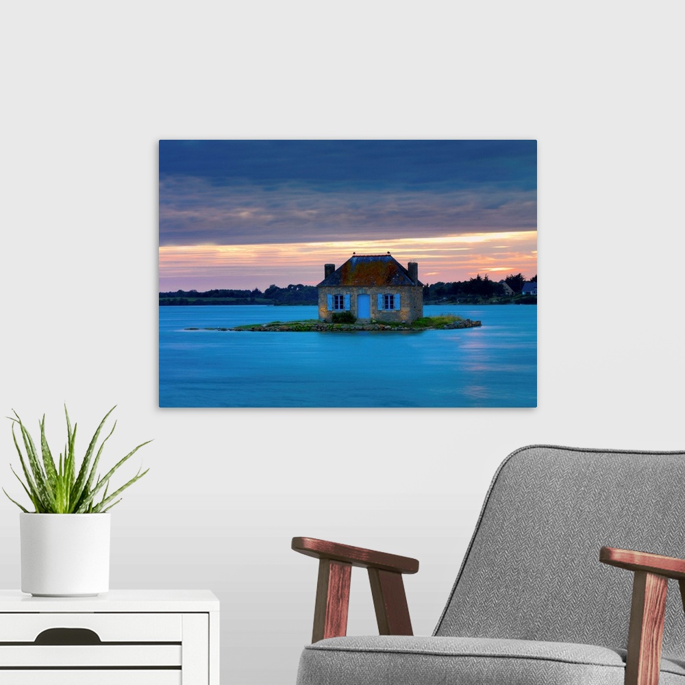 A modern room featuring France, Brittany, Morbihan, Belz, Etel river, St. Cado, house on the island of Nichtarguer at dusk.