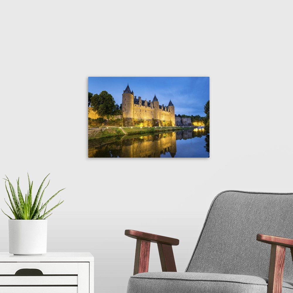 A modern room featuring France, Brittany (Bretagne), Morbihan department, Josselin. Chateau de Rohan castle on the Oust R...