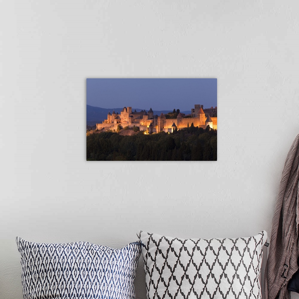 A bohemian room featuring France, Languedoc-Rousillon, Carcassonne. The fortifications of Carcassonne at dusk.