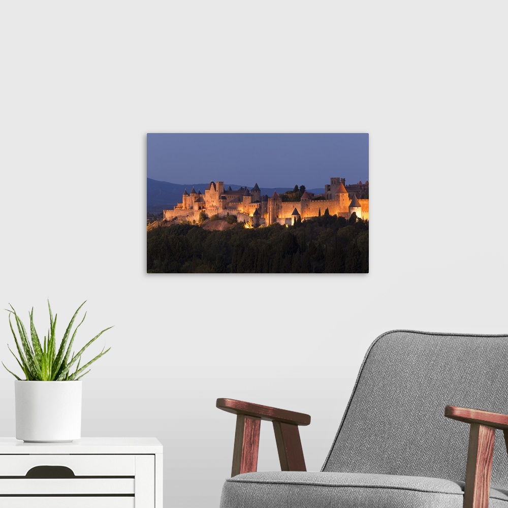 A modern room featuring France, Languedoc-Rousillon, Carcassonne. The fortifications of Carcassonne at dusk.