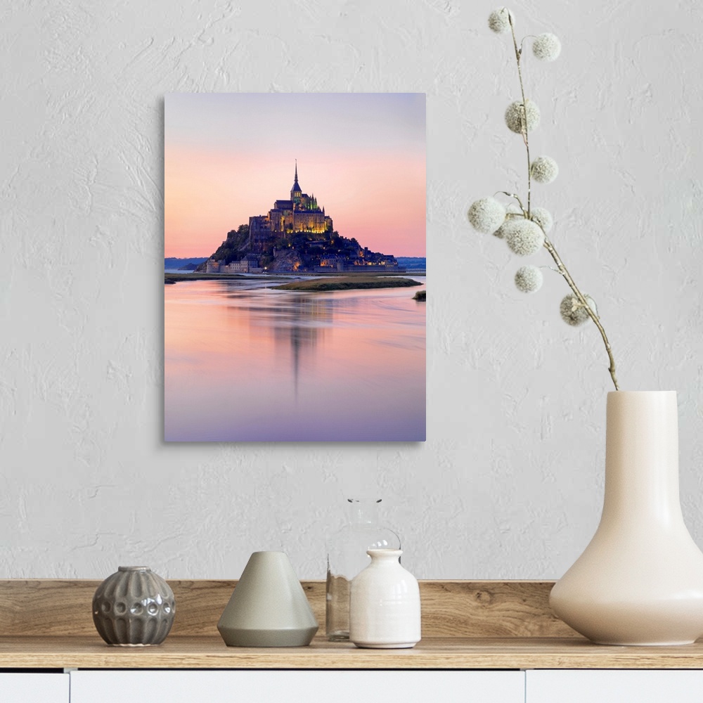 A farmhouse room featuring France, Normandy, Le Mont Saint Michel reflected in river at night.