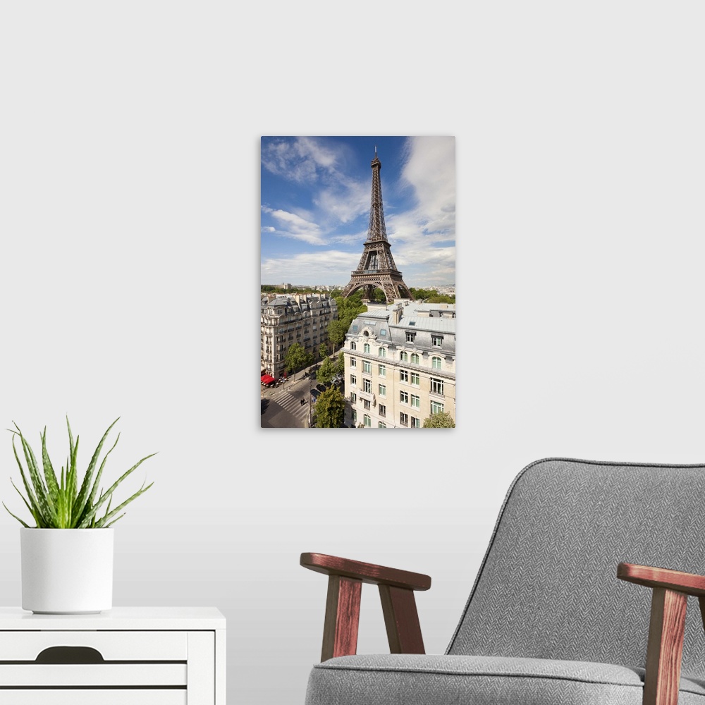 A modern room featuring France, Paris, Eiffel Tower, viewed over rooftops