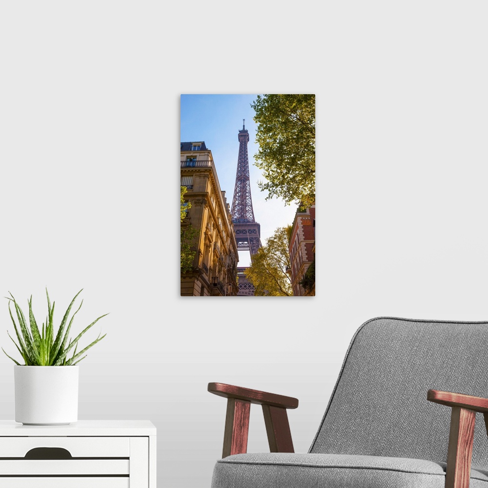 A modern room featuring France, Paris, Eiffel Tower, view through street.