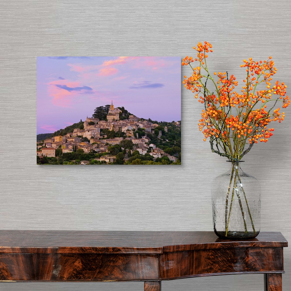 A traditional room featuring France, Provence, Bonnieux, Hilltop village at dusk