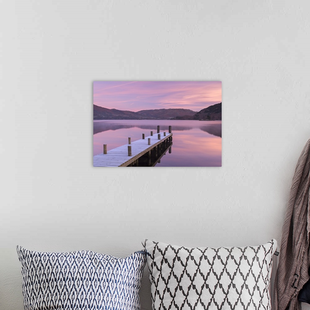 A bohemian room featuring Frosty wooden jetty on Ullswater at dawn, Lake District, Cumbria, England. Winter (November)