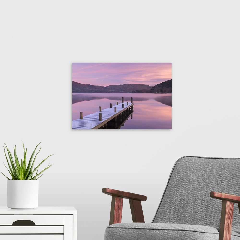 A modern room featuring Frosty wooden jetty on Ullswater at dawn, Lake District, Cumbria, England. Winter (November)