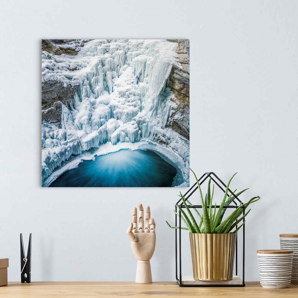 A bohemian room featuring Frozen Lower Johnston Canyon Falls In Winter, Banff National Park, Alberta, Canada