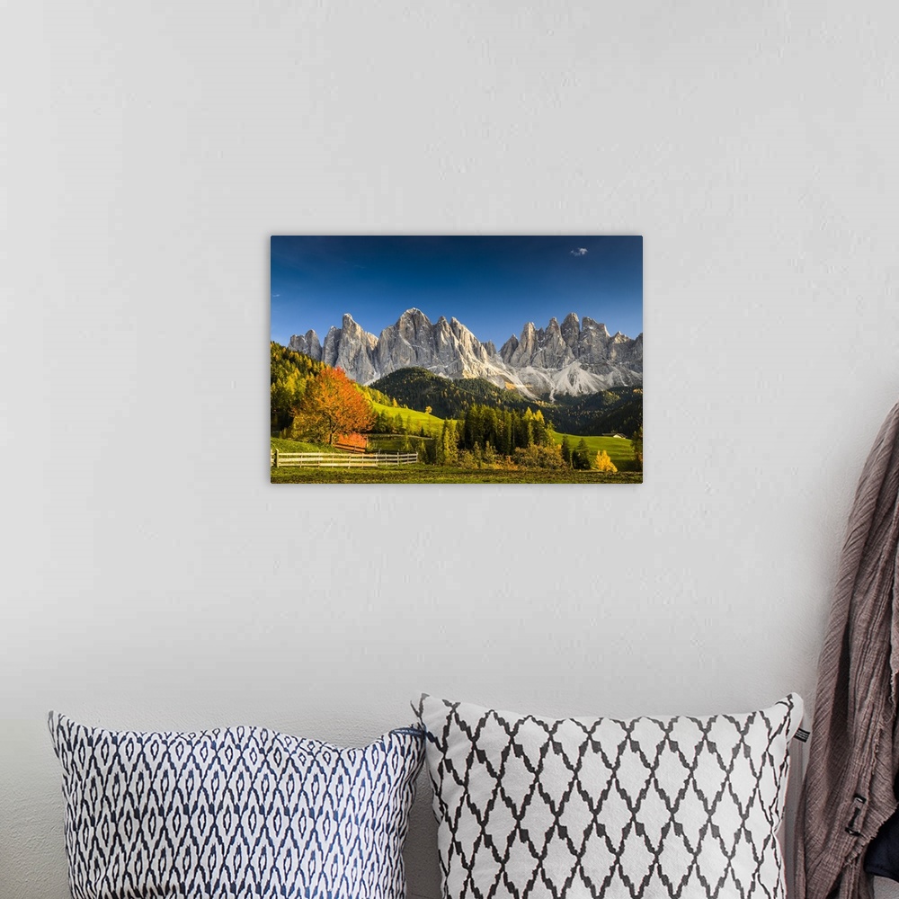 A bohemian room featuring Funes Valley, Odle, dolomites, Alto Adige, Italy.