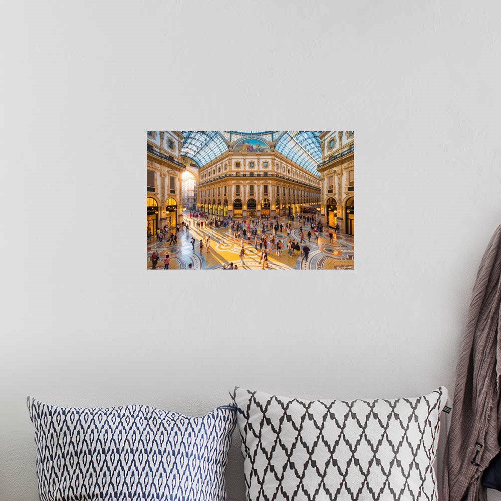 A bohemian room featuring Galleria Vittorio Emanuele II, Milan, Lombardy, Italy. Tourists walking in the world's oldest sho...