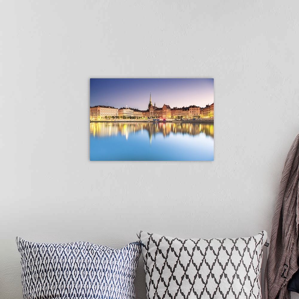 A bohemian room featuring Gamla stan, Stockholm, Sweden, Northern Europe. Cityscape at sunrise.
