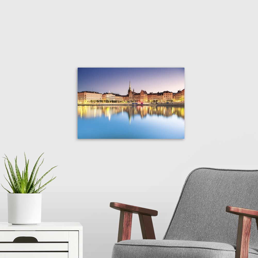 A modern room featuring Gamla stan, Stockholm, Sweden, Northern Europe. Cityscape at sunrise.