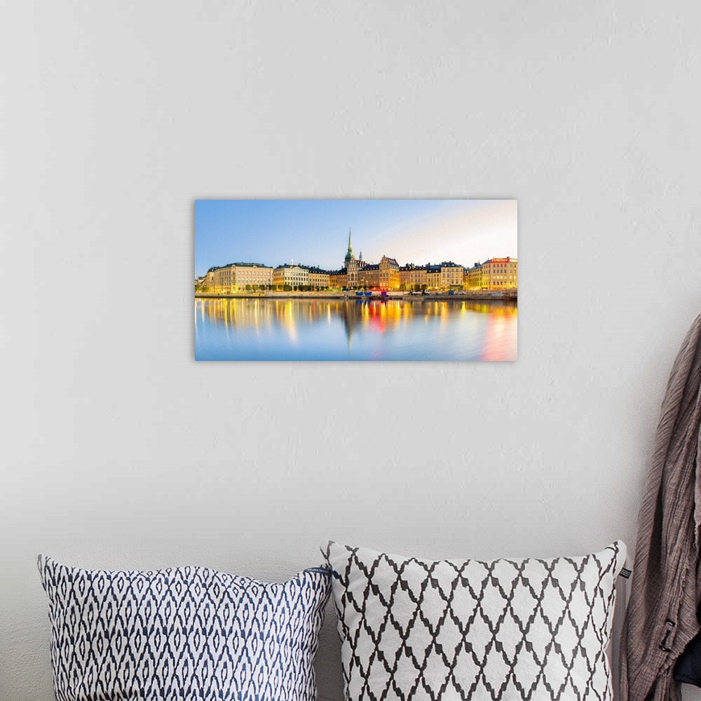 A bohemian room featuring Gamla stan, Stockholm, Sweden, Northern Europe. Cityscape panorama at sunrise.