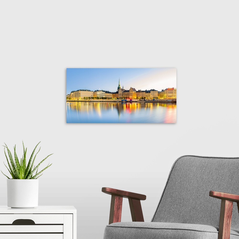 A modern room featuring Gamla stan, Stockholm, Sweden, Northern Europe. Cityscape panorama at sunrise.