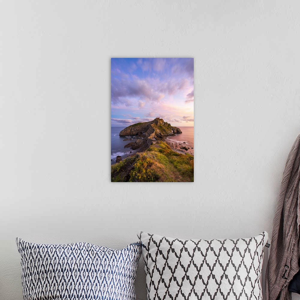 A bohemian room featuring Gaztelugatxe, Biscay, Basque Country, Spain. View of the islet and the hermitage at sunrise