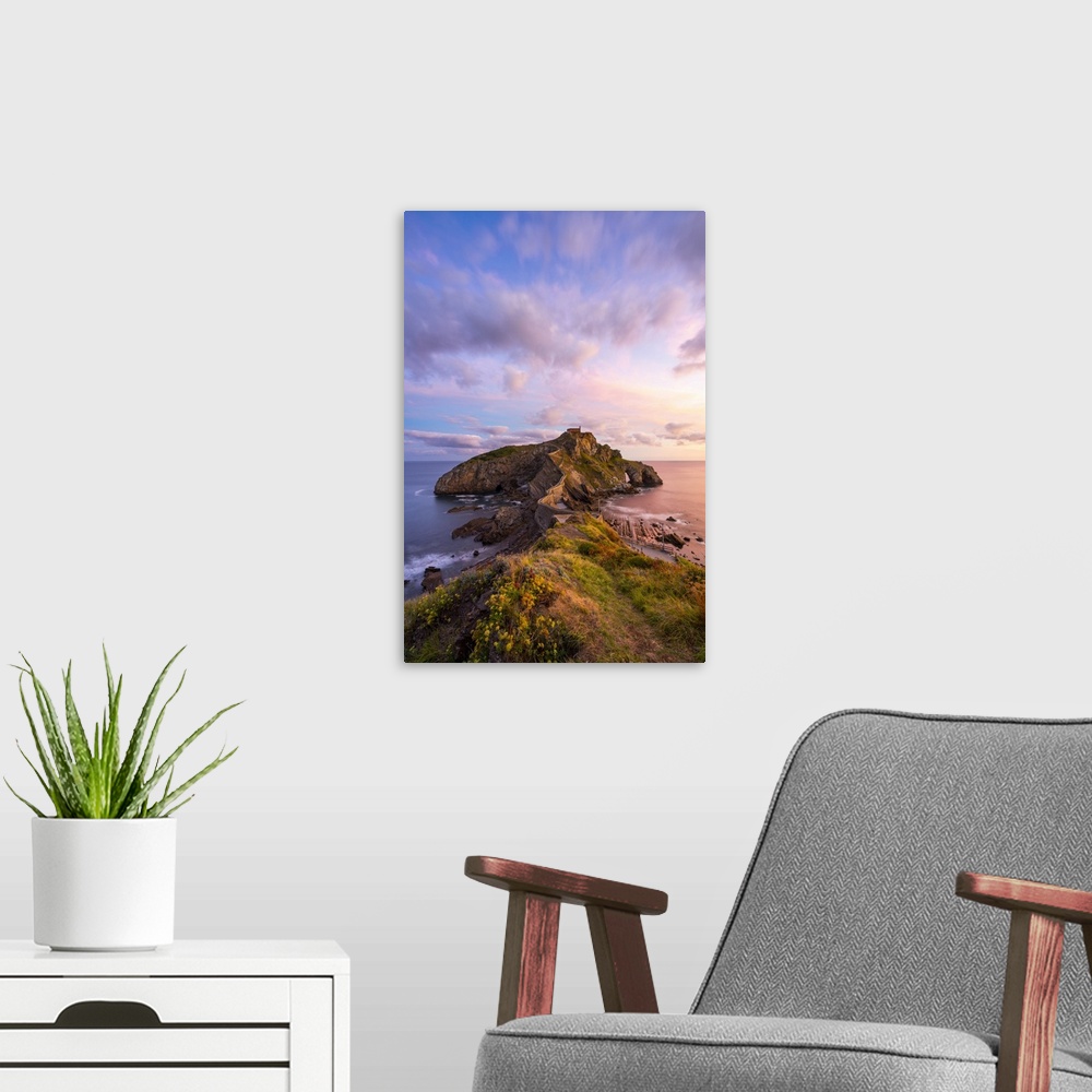 A modern room featuring Gaztelugatxe, Biscay, Basque Country, Spain. View of the islet and the hermitage at sunrise