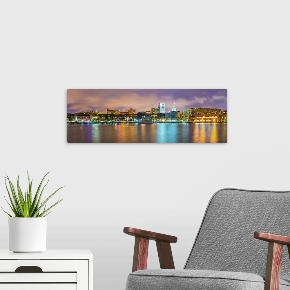 A modern room featuring USA, Georgia, Savannah, Skyline reflected in the Savannah river.
