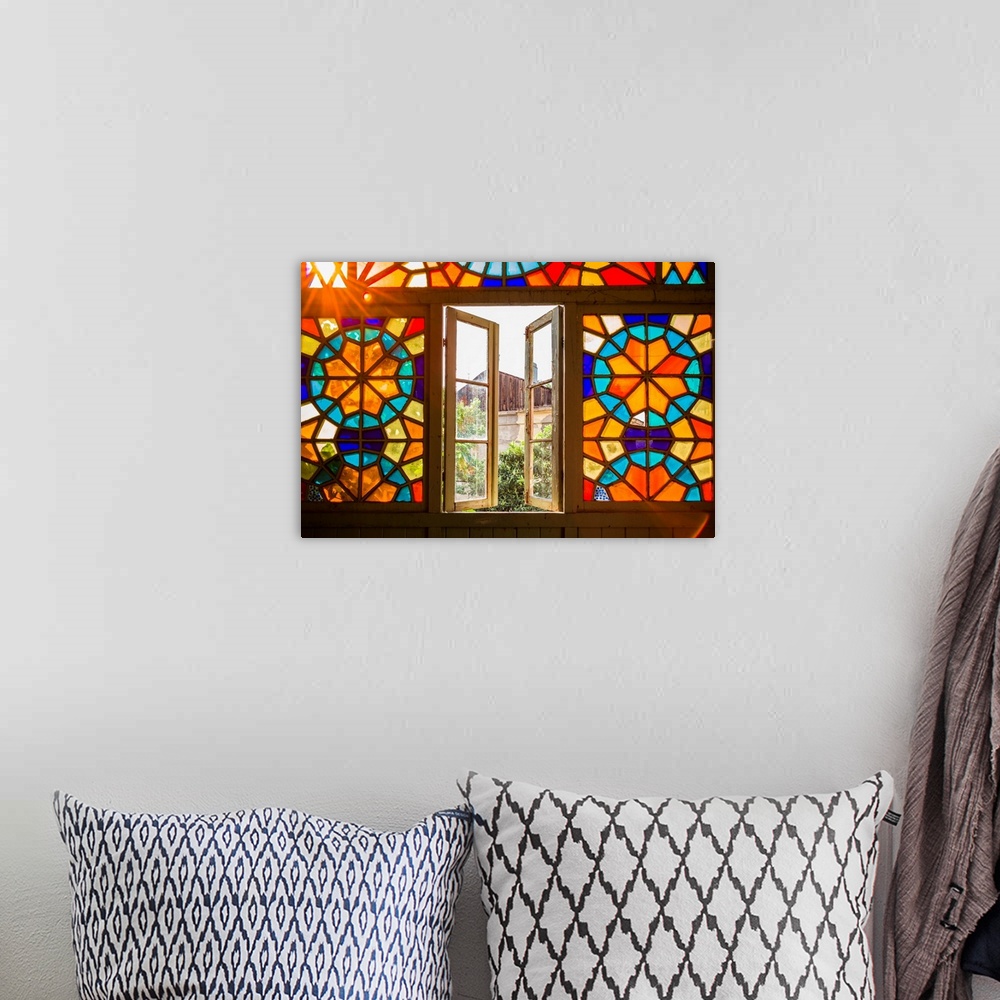 A bohemian room featuring Georgia, Tbilisi, Old Town, traditional Georgian building with stained-glass staircase.