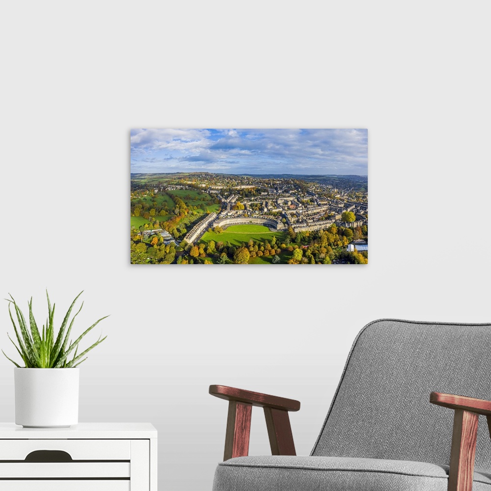A modern room featuring Aerial view over the Georgian city of Bath, Royal Victoria Park and Royal Cresent, Somerset, England