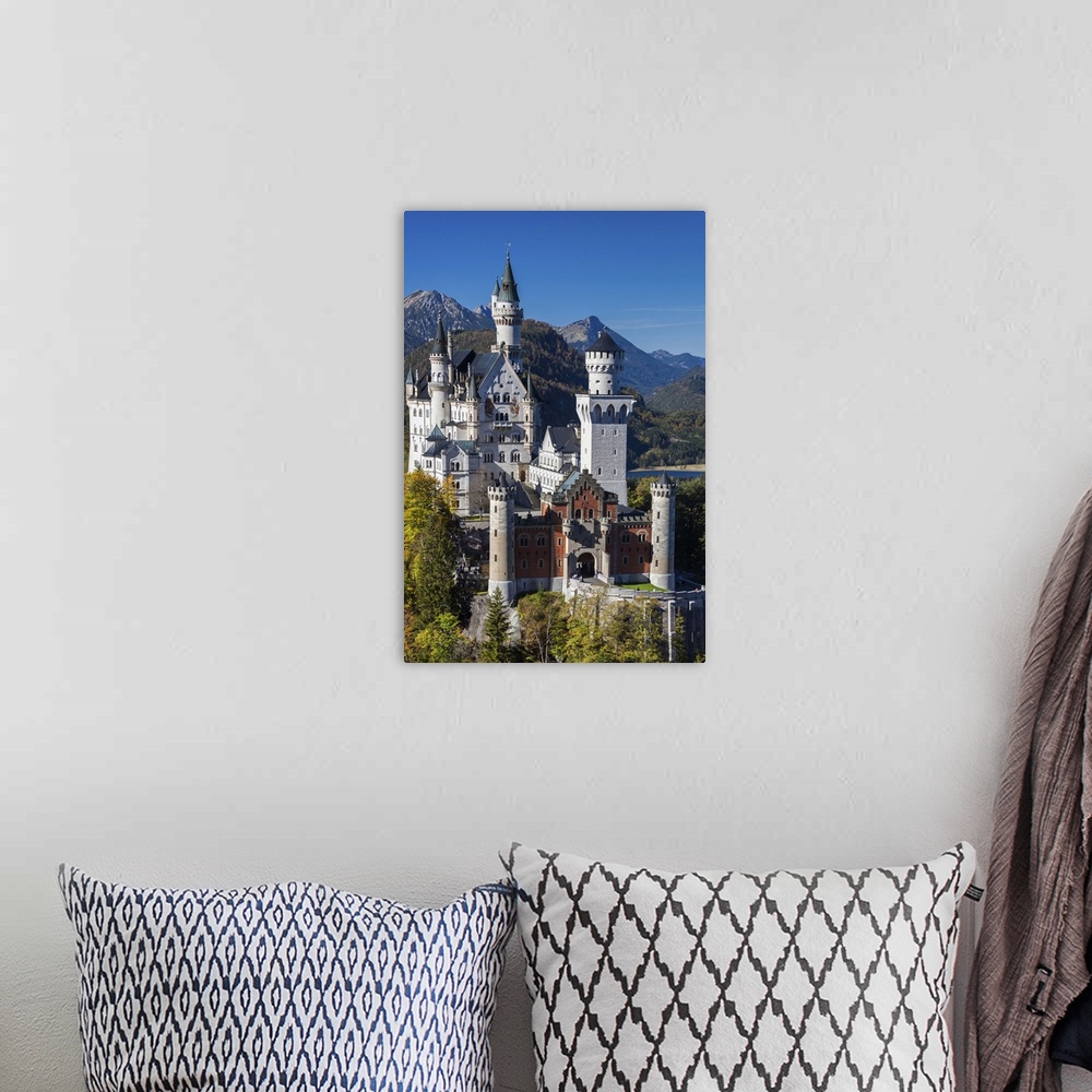 A bohemian room featuring Germany, Bavaria, Hohenschwangau, Schloss Neuschwanstein castle, elevated view, fall.