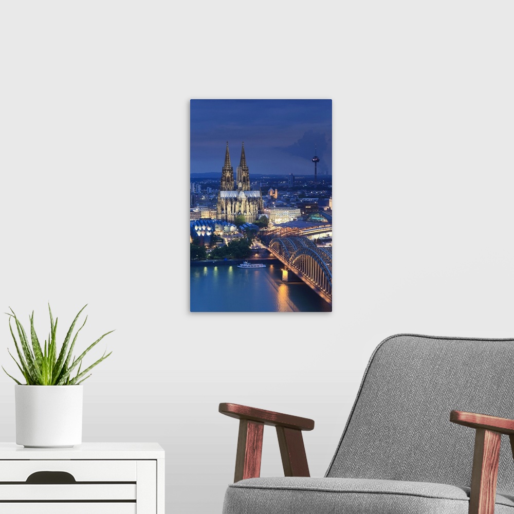 A modern room featuring Germany, North Rhine Westphalia, Cologne (Koln), Hohenzoller Bridge over River Rhine and Cathedral