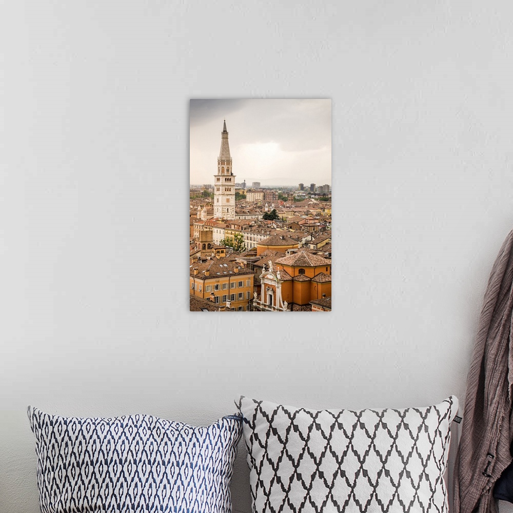 A bohemian room featuring Ghirlandina tower from top of Military Academy Palace in Piazza Roma. Modena, Emilia Romagna, Italy