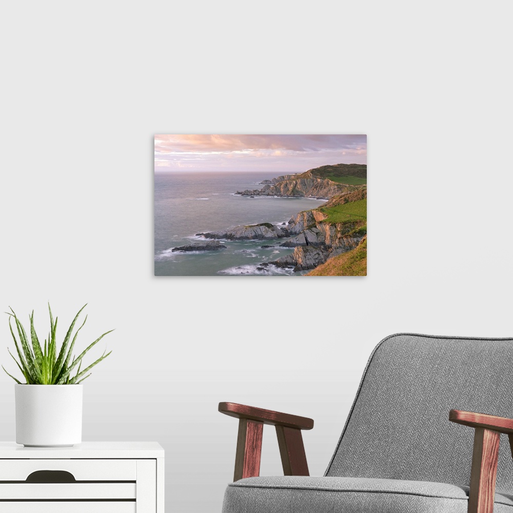 A modern room featuring Glorius evening light on the North Devon coast near Ilfracombe, England. Spring (May)