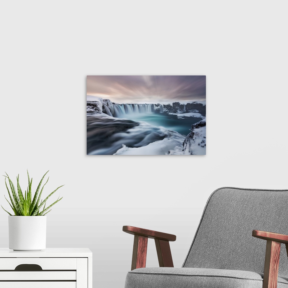 A modern room featuring Godafoss waterfall at sunset during winter time, Akureiry, Iceland. Western Europe, Iceland.