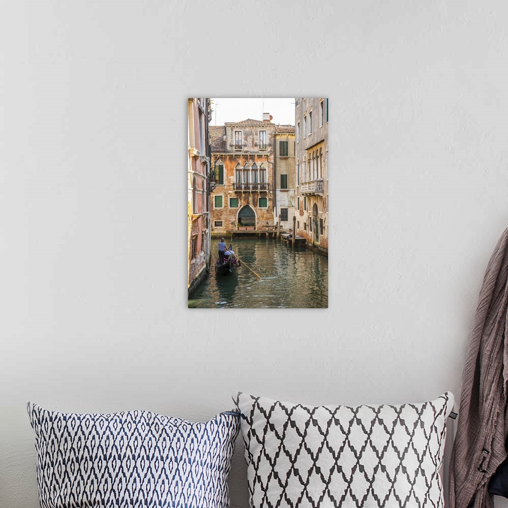 A bohemian room featuring Gondola on canal in Venice, Veneto, Italy.
