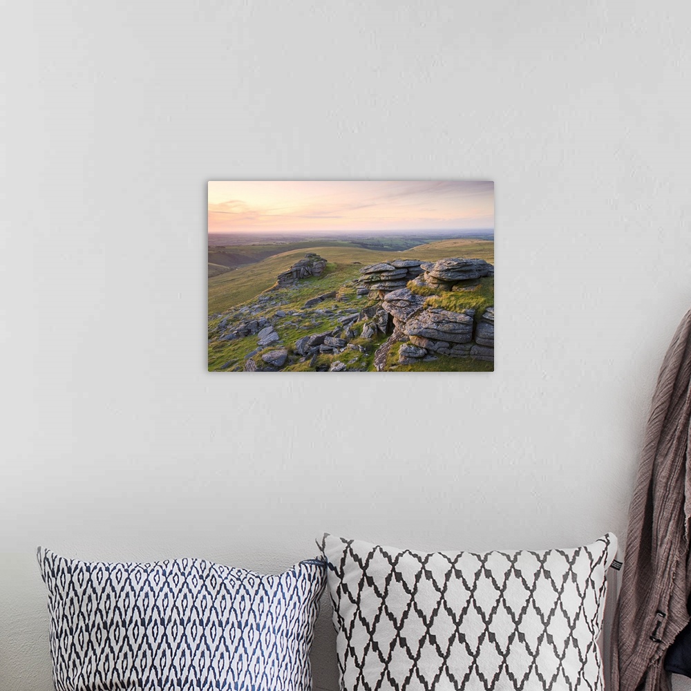 A bohemian room featuring Granite outcrops at Black Tor on a summer evening, Dartmoor National Park, Devon, England. Summer...