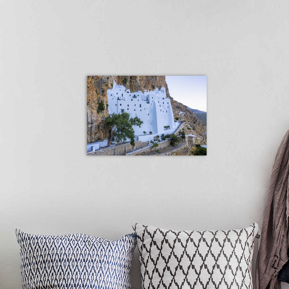 A bohemian room featuring Greece, Cyclades Islands, Amorgos, Moni Panagias Chozoviotissas Monastery.