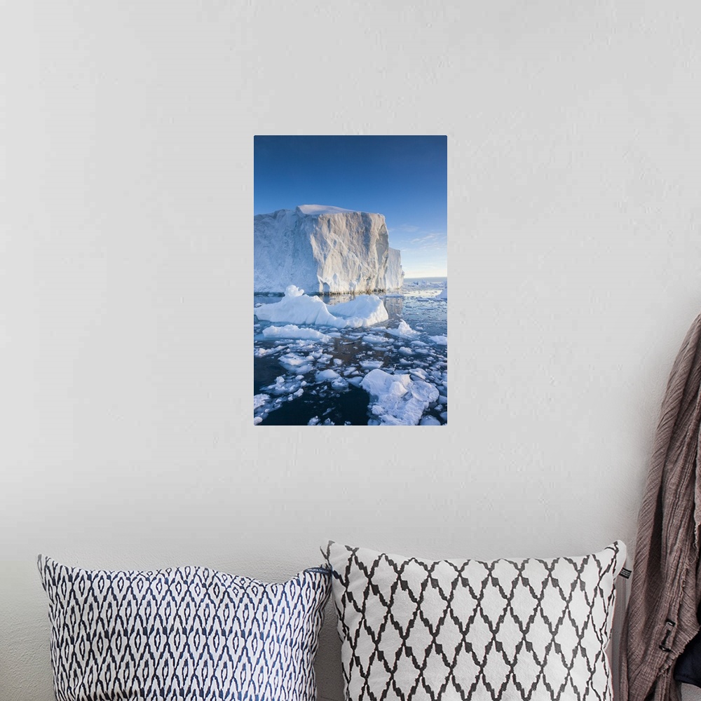 A bohemian room featuring Greenland, Disko Bay, Ilulissat, floating ice at sunset.