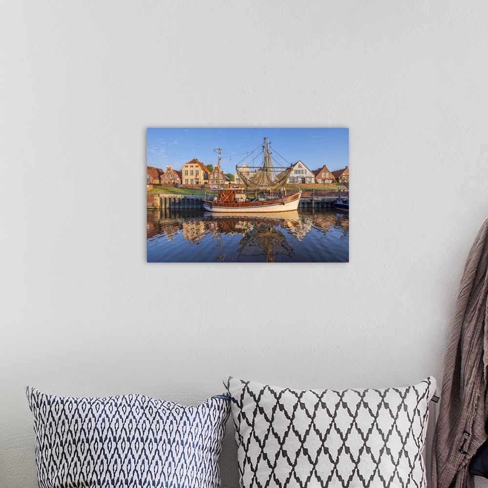 A bohemian room featuring Greetsiel harbor in early morning light, Krummhorn, East Frisia, Lower Saxony, Germany