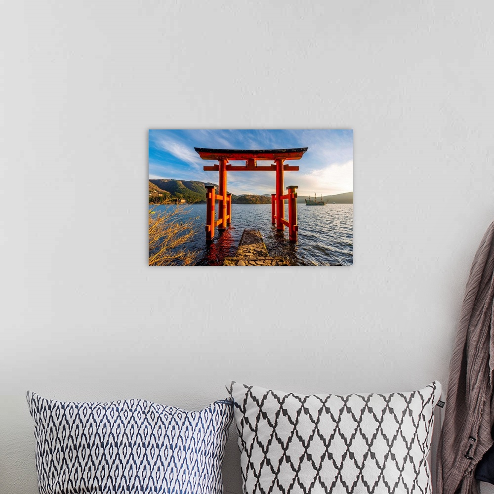 A bohemian room featuring Hakone, Kanagawa Prefecture, Honshu, Japan. Red torii gate at lake Ashi.