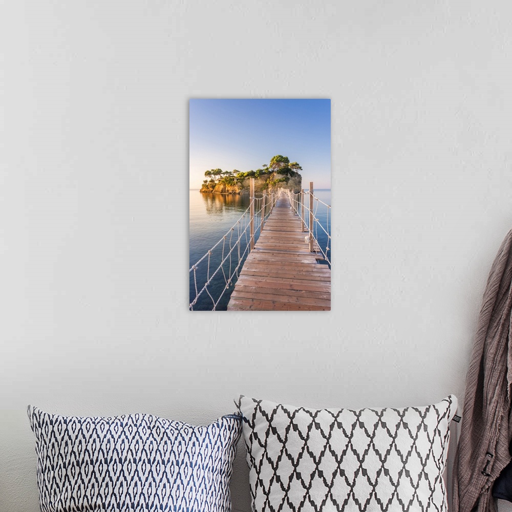 A bohemian room featuring Hanging wooden bridge over the sea leading to Cameo Island, Agios Sostis, Zakynthos, Ionian Islan...