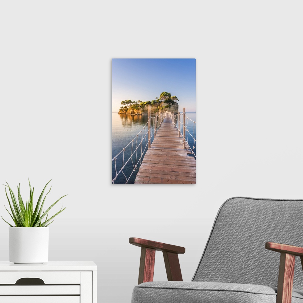 A modern room featuring Hanging wooden bridge over the sea leading to Cameo Island, Agios Sostis, Zakynthos, Ionian Islan...