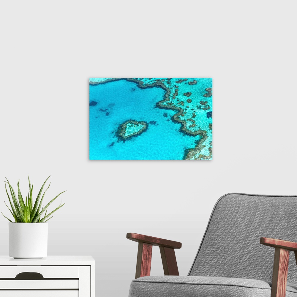 A modern room featuring Heart reef in the Great Barrier Reef from above, Queensland, Australia.