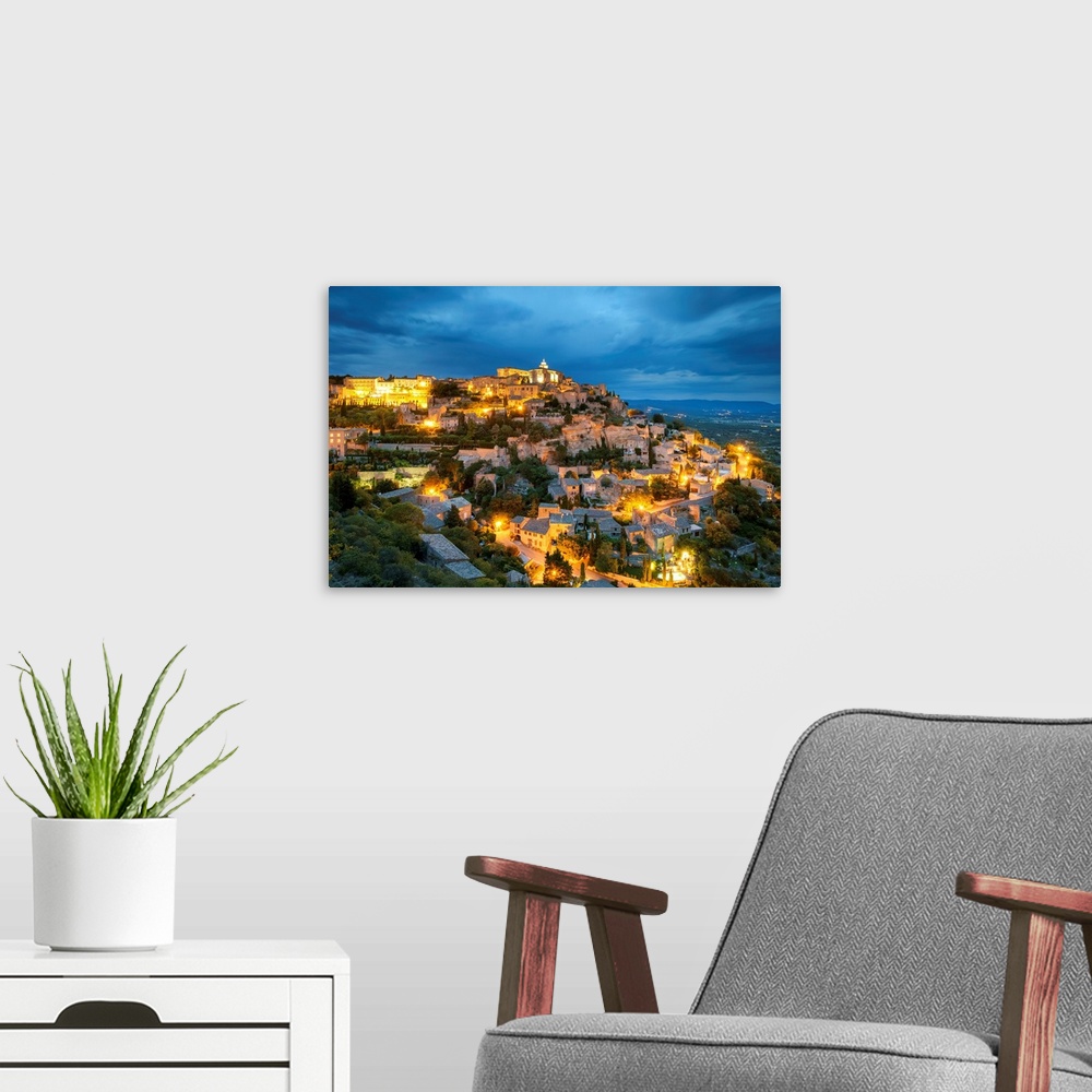 A modern room featuring Hilltop town of Gordes at dusk, Vaucluse, Provence-Alpes-Cote d'Azur, France.