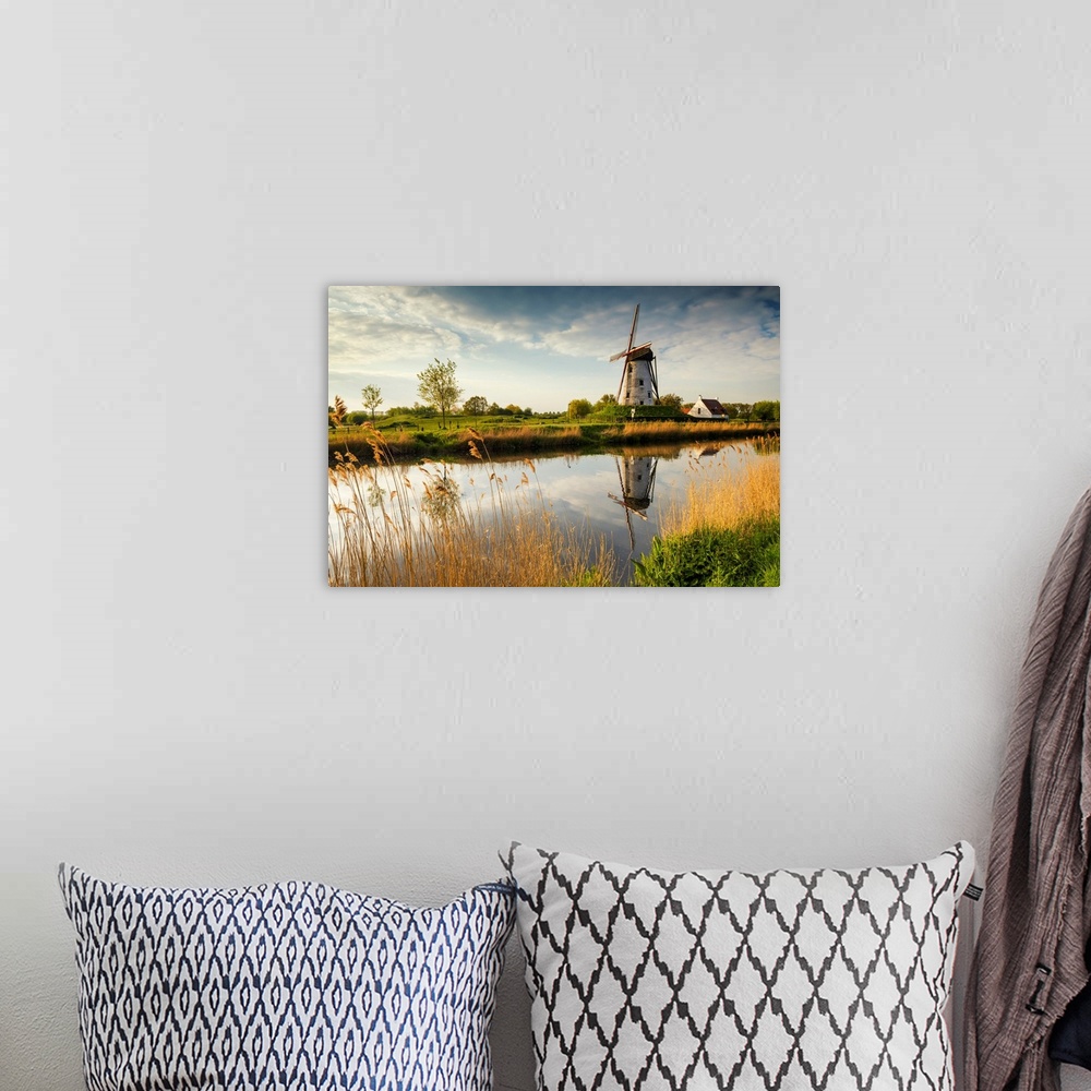 A bohemian room featuring Hoeke Windmill Reflecting In Canal, Damme, Belgium