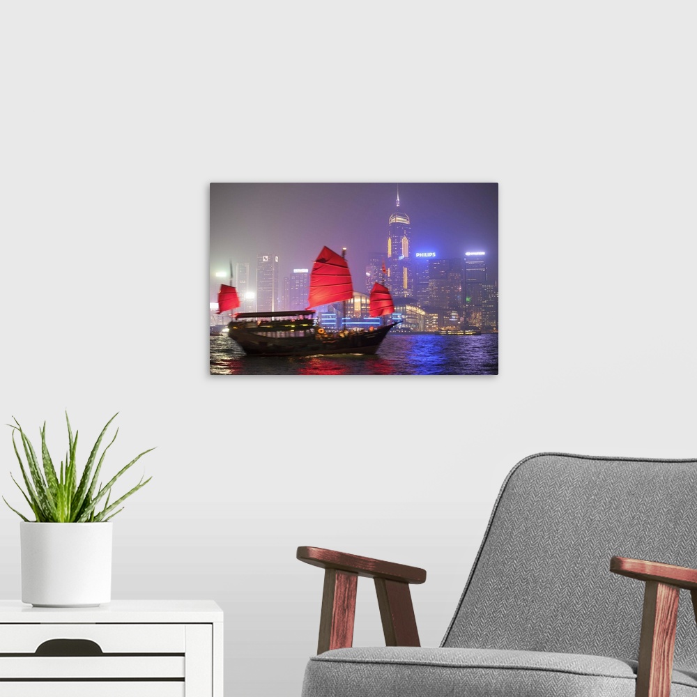 A modern room featuring Hong Kong, China. Traditional chinese junk sail in Victoria harbour